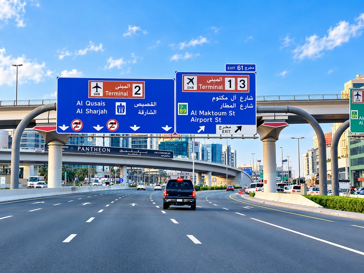 Dubai airport terminal directional overhead signs
