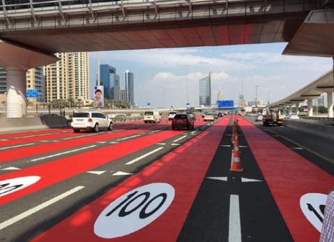Red high-visibility roadway surface