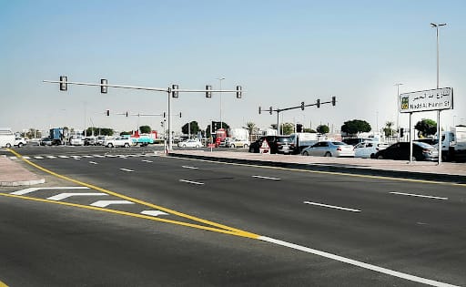 Wide signalized junction with painted markings